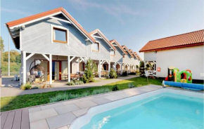 Nice Home In Karwia With Heated Swimming Pool